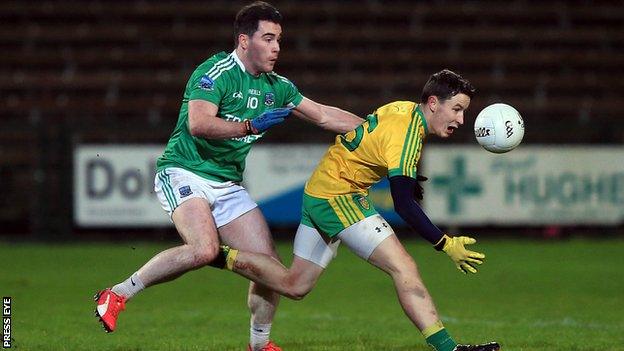 Fermanagh's Barry Mulrone challenges Donegal's Eoin McHugh