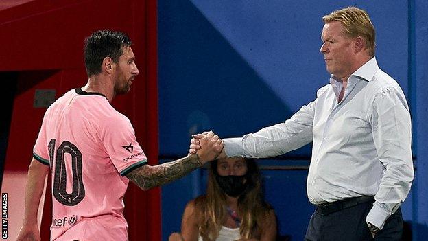 Lionel Messi shakes hands with Ronald Koeman