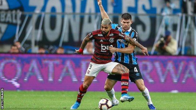 Flamengo's Gabriel Barbosa (left) and Gremio's Walter Kannemann