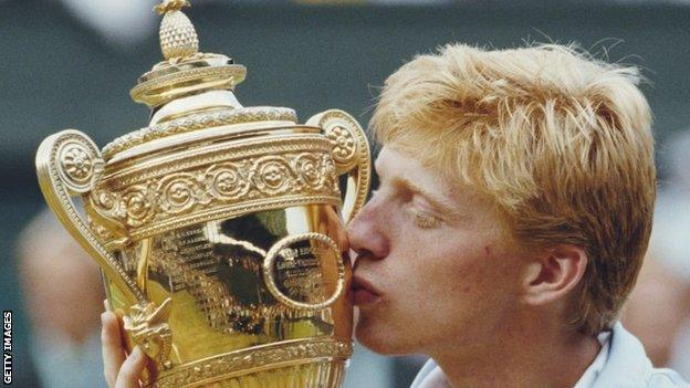 Boris Becker kisses the Wimbledon trophy after his 1985 win
