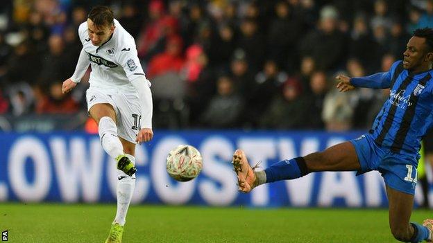 Swansea midfielder Bersant Celina lets fly to score in the FA Cup win over Gillingham