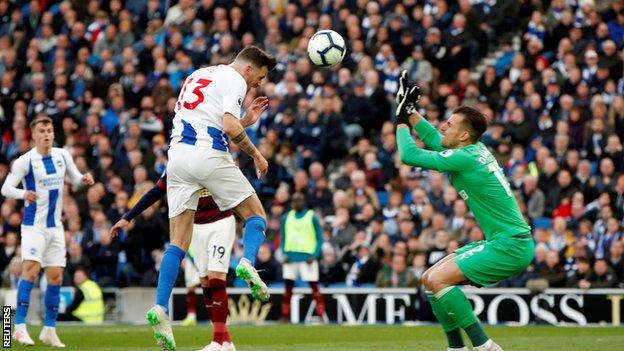 Pascal Gross (left) scores