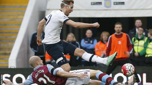 Harry Kane scores as Alan Hutton dives in