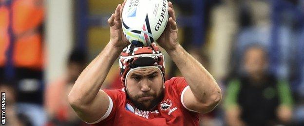 Jebb Sinclair catches a line-out during Canada's World Cup pool match against Romania