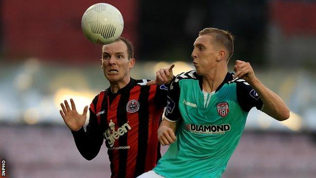 Derek Pender and Ronan Curtis in action at Dalymount Park