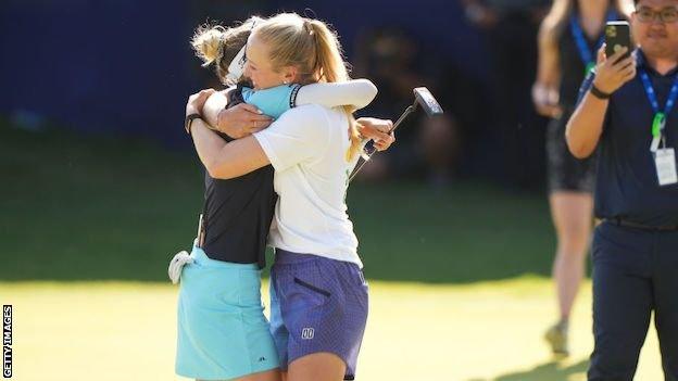 Nelly and Jessica Korda hug