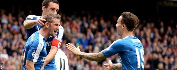 David Templeton (left) celebrates opening the scoring