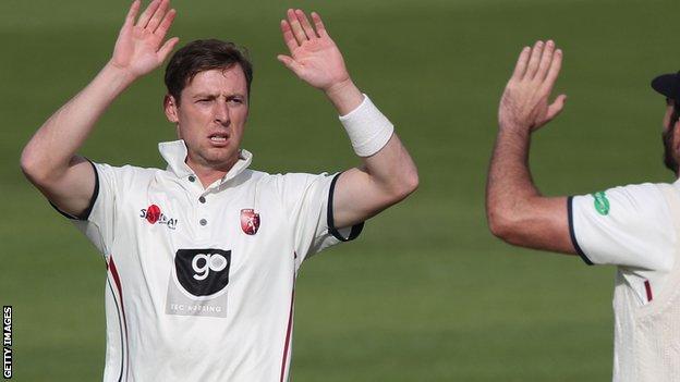 Matt Henry celebrates a wicket for Kent