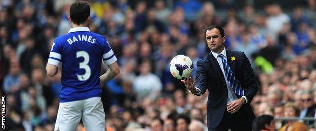 Everton manager Roberto Martinez and full-back Leighton Baines