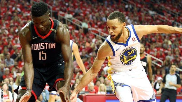 Houston Rockets' Clint Capela (left) and Golden State's Stephen Curry