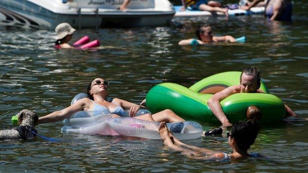 People relaxing in the water