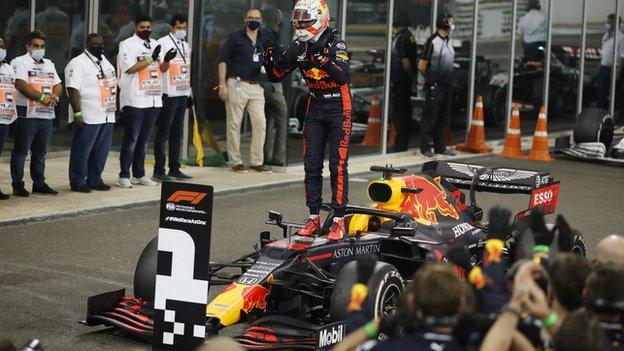 Max Verstappen celebrate winning the Abu Dhabi Grand Prix