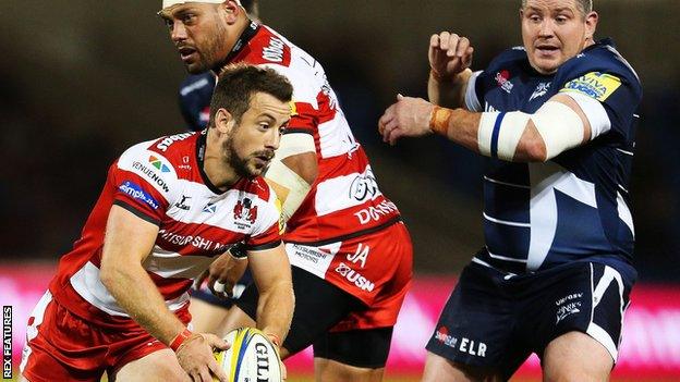 Greig Laidlaw plays the ball for Gloucester