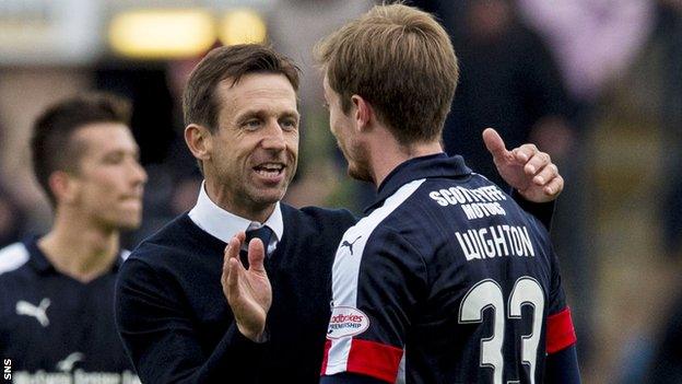 Neil McCann celebrates with Dundee striker Craig Wighton