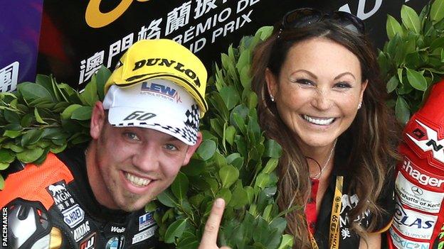 Faye Ho pictured with current FHO Racing rider Peter Hickman after he won the 2018 Macau Grand Prix