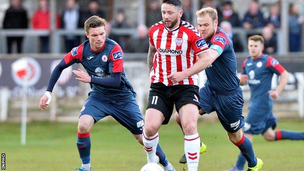 Rory Patterson (centre) in action against Sligo Rovers last season