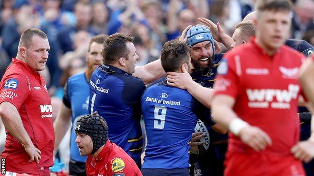 Leinster celebrate Scott Fardy's try as Scarlets despair