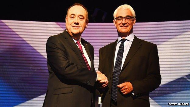 The two leaders shake hands at the debate