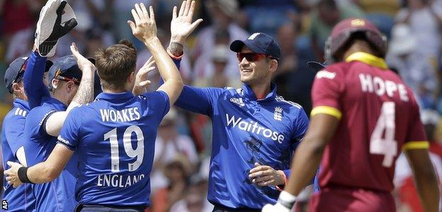 Chris Woakes and Alex Hales (right) combined to dismiss Kraigg Brathwaite