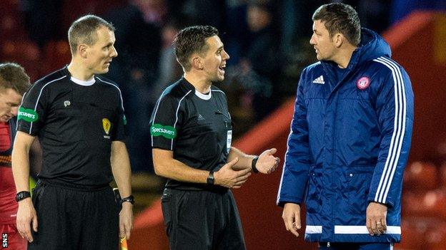 Martin Canning speaking to referees