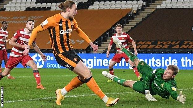 Tom Eaves celebrates his winning goal for Hull