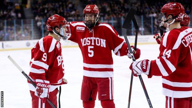 Logan Cockerill celebrates scoring for Boston University against University of Connecticut