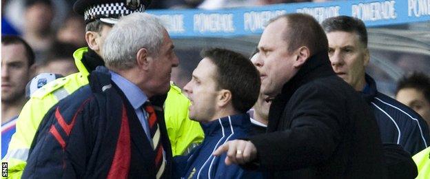 Walter Smith, of Rangers, and Hibernian's Mixu Paatelainen square up during a Scottish Cup tie at Ibrox