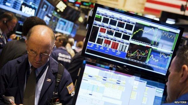 Traders work on floor of New York Stock Exchange