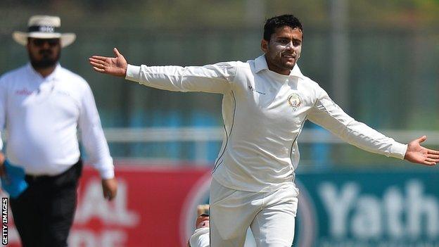 Afghanistan's Zahir Khan celebrates a wicket