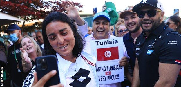 Ons Jabeur greets fans at Wimbledon