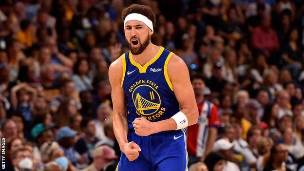 Golden State Warriors guard Klay Thompson celebrates hitting a three-pointer against Memphis Grizzlies