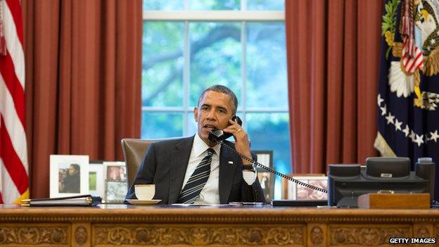 President Obama talking on the phone to President Rouhani of Iran in September 2013