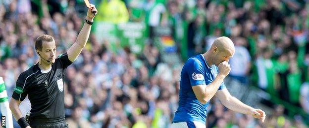 Philippe Senderos is shown a red card