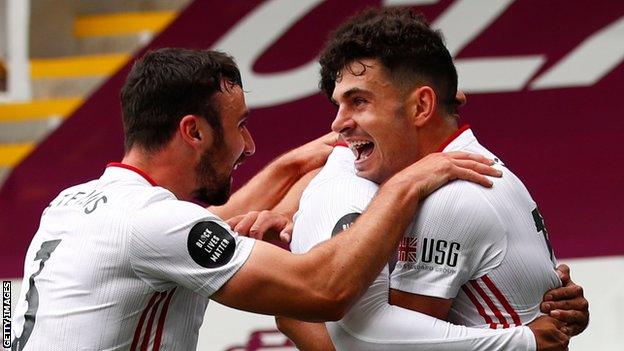 John Egan (right) celebrates with team-mates