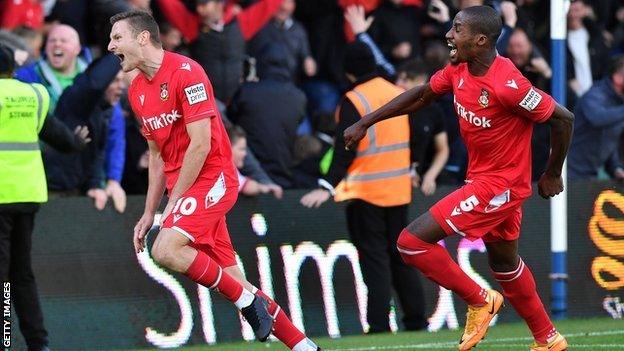 Wrexham's Paul Mullin and Aaron Hayden celebrate