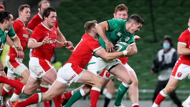 Johnny Sexton carries against Wales