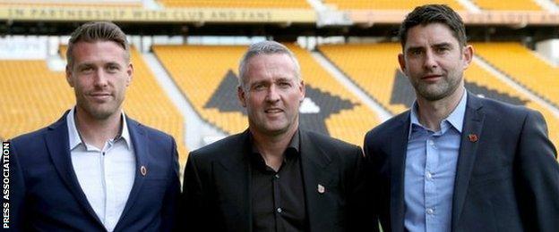 Paul Lambert and Wolves' new backroom team of Rob Edwards (left) and Stuart Taylor