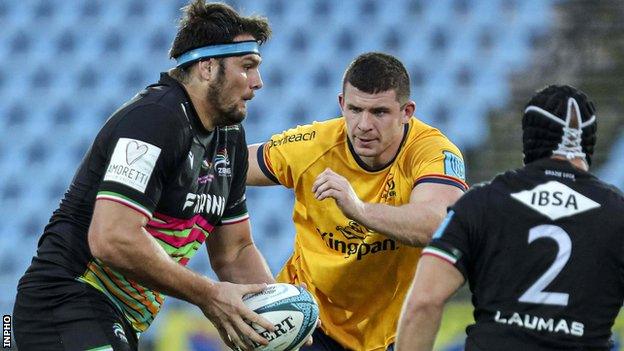 Ulster's Nick Timoney is about to get in a tackle on Zebre's David Sisi