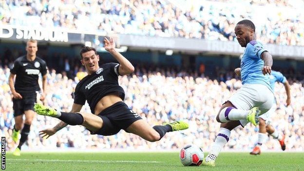 Raheem Sterling shoots against Brighton