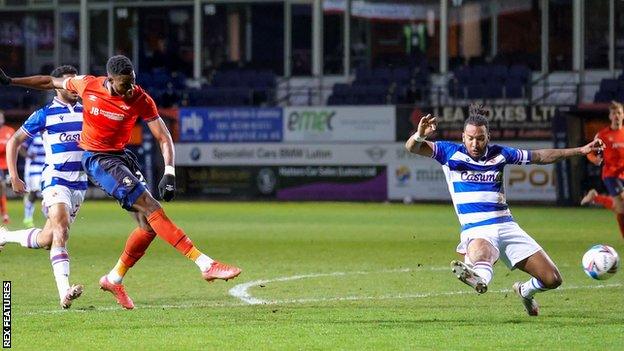 Elijah Adebayo goes close with a shot for Luton Town against Reading