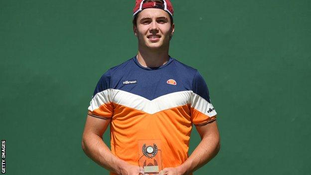 Arthur Fery lifts a British Tour trophy