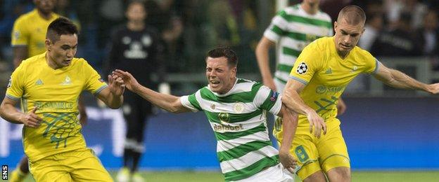 Celtic's Callum McGregor (centre) is fouled against Astana