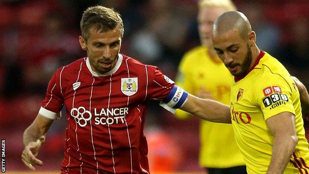 Bristol City's Gary O'Neil challenges Watford player Nordin Amrabat for the ball