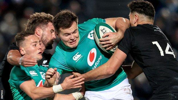 Michael Lowry and Jacob Stockdale battle with Braydon Ennor and Shaun Stevenson during Ireland A's heavy defeat by an All Blacks XV at the RDS