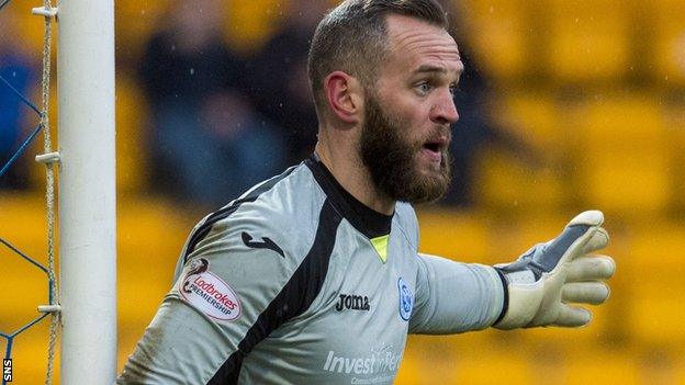 Alan Mannus believes his international manager favours a move to a club