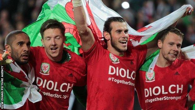 Ashley Williams (left), Wayne Hennessey, Gareth Bale and Chris Gunter celebrate Wales' Euro 2016 qualification