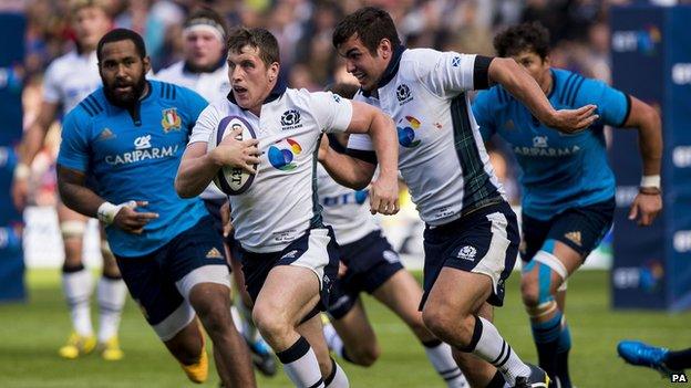 Scotland's Mark Bennett on his way to scoring a try of the day during the World Cup Warm Up Match