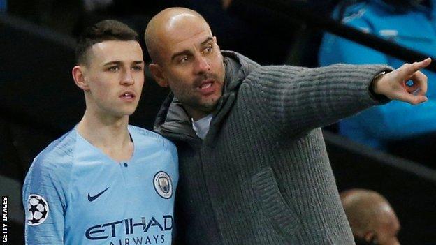 Pep Guardiola and Phil Foden