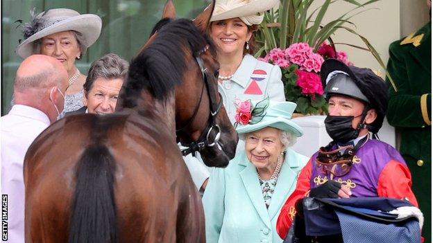 The Queen at Royal Ascot 2021 with Frankie Dettori wearing her silks