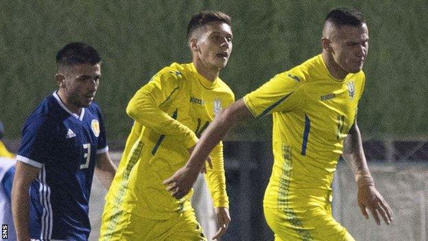 Bogdan Mykhaylichenko (right) celebrate scoring for Ukraine against Scotalnd